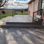 Trex Rocky Harbor, Williams bronze cable railing and Riverfront patio pavers